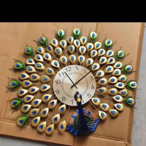 Madhuram metal peacock art cum clock